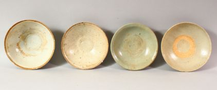 FOUR CHINESE TERRACOTTA BOWLS, various sizes, approx. 16cm diameter.