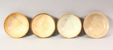 FOUR CHINESE TERRACOTTA BOWLS, various sizes, approx. 16cm diameter.