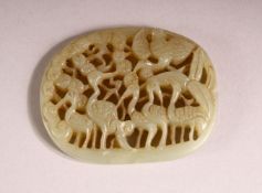 A CHINESE CARVED GREEN JADE PENDANT OF CRANE - carved in openwork with crane and foliage, 6.2cm