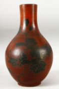 AN UNUSUAL JAPANESE LACQUERED PORCELAIN VASE, the body with fine gilt work decoration depicting a