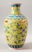 A CHINESE POLYCHROME PORCELAIN LANTERN VASE, the body decorated with flowers and bats, 35.5cm high.