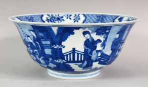 A GOOD CHINESE BLUE AND WHITE KANGXI BOWL, the centre painted with boys playing, the sides with
