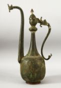 A LARGE 18TH CENTURY SAFAVID TINNED COPPER EWER, with dragon shaped spout and handle, 40cm high.