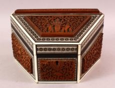 AN INDIAN CARVED WOOD & INLAID IVORY & EBONY LIDDED BOX, carved with figures and birds amongst