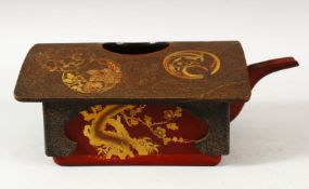 A JAPANESE GILT AND LACQUER SQUARE FORM TEAPOT, the vessel decorated with fine gilt work roundels of