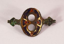 A RARE BYZANTINE OR POSSIBLY VIKING ENAMELLED BRONZE BELT BUCKLE, 6cm x 3.5cm.