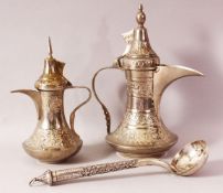 TWO INDIAN DALLAH WHITE METAL COFFEE POTS & LADLE - The ladle possibly with a silver handle,