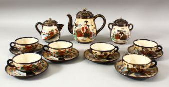 A JAPANESE SATSUMA TEA SET, comprising of one teapot and cover, milk jug and cover, sugar pot and