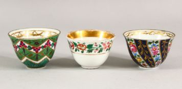 THREE 18TH/19TH CENTURY FRENCH ZARA CUPS FOR THE OTTOMAN MARKET, each with floral and gilt