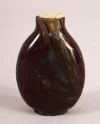 A CHINESE HARDSTONE / GLASS SNUFF BOTTLE - with varied colour decoration, 6cm