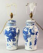 A PAIR OF CHINESE BLUE AND WHITE PORCELAIN JARS AND COVERS converted to lamps, both decorated with