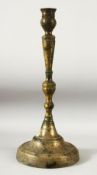 A LARGE 17TH/18TH CENTURY OTTOMAN BRONZE CANDLESTICK, 49cm high.