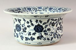 A LARGE CHINESE BLUE AND WHITE WASH POT, profusely decorated with lotus flowers, 32cm diameter.