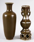 A CHINESE PORCELAIN OLIVE GREEN VASE, the base with blue six character mark, 21cm high, together