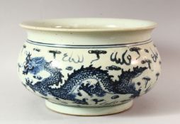 A LARGE CHINESE BLUE AND WHITE BOWL, painted with dragon and phoenix with the flaming pearl of