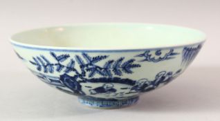 A CHINESE BLUE AND WHITE PORCELAIN BOWL, decorated with children in a landscape setting, 19.5cm