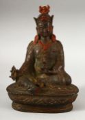 A CHINESE BRONZE BUDDHA, with traces of original paint, 19cm high.