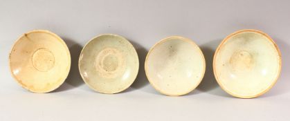 FOUR CHINESE TERRACOTTA BOWLS, various sizes, approx. 16cm diameter.