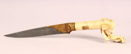A GOOD INDIAN CARVED BONE & INLAID WATERED STEEL DAGGER, the hilt formed as an elephant from