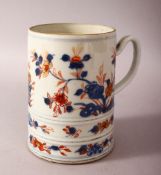 AN 18TH CENTURY CHINESE IMARI PORCELAIN TANKARD - decorated with underglaze blue and orange floral