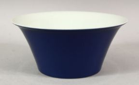 A GOOD CHINESE BLUE GLAZED BOWL with white interior, six character mark in blue, 15cm diameter.