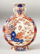 A JAPANESE IMARI TWIN HANDLE PORCELAIN MOONFLASK, decorated in the typical imari style, the base