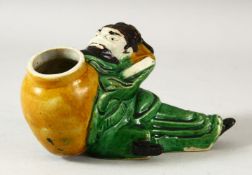 A CHINESE FAMILLE VERTE FIGURE OF POET LI BAI, the drunken figure leaning on a wine jar, 14cm long.