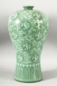 A LARGE KOREAN CELADON PORCELAIN VASE, decorated with roundels of flying cranes, the base with mark,