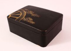 A JAPANESE MEIJI PERIOD GILT & LACQUER LIDDED BOX - decorated to the lid with scenes of a rickshaw