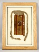 AN EARLY PERUVIAN CHANCAY TEXTILE FRAGMENT, framed and glazed, fragment approx. 29cm x 13cm.