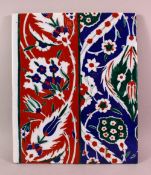 A TURKISH IZNIK STYLE POTTERY TILE SECTION, with floral decoration, 33cm x 27cm
