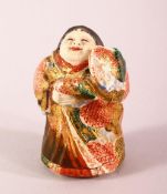 A JAPANESE MEIJI PERIOD SATSUMA BOX & COVER IN THE FORM OF A BOY - the boy looking up, the base