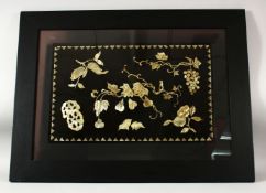 A CHINESE DECORATIVE LACQUER PANEL INLAID WITH MOTHER OF PEARL, depicting various fruits and