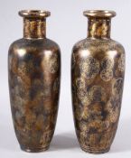 A PAIR OF UNUSUAL CHINESE METALLIC GLAZE PORCELAIN VASES, the bases with blue four character mark,
