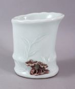 A CHINESE CELADON BAMBOO FORMED PORCELAIN BRUSH WASH, the pot formed as a bamboo stalk with carved