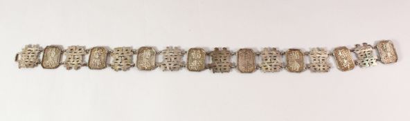 A CHINESE SILVER BELT, circa 1900, marked 'WC', the overall belt measuring approx. 63cm long.