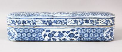 A LARGE CHINESE BLUE AND WHITE PORCELAIN STATIONERY BOX, painted with lotus flower, six character