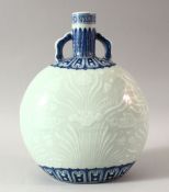 A CHINESE MING STYLE BLUE AND WHITE TWIN HANDLE MOONFLASK, the body decorated with fish amongst