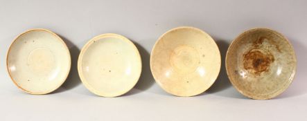 FOUR CHINESE TERRACOTTA BOWLS, various sizes, approx. 16cm diameter.
