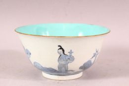 A CHINESE BLUE, WHITE AND TURQUOISE PORCELAIN TEA BOWL, the sides with incised scale ground and