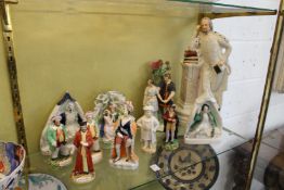 A good collection of Staffordshire figures to include a large figure of Shakespeare together with