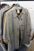 A ladies' Burberry grey and blue check raincoat.
