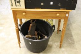 A small pine side table.