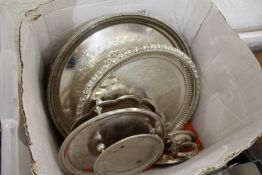 Plated salvers, waiters and an entree dish and cover.