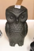 A cast iron model of an owl.