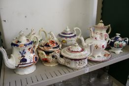 19th century lustre decorated teapots, sucriers and stands.