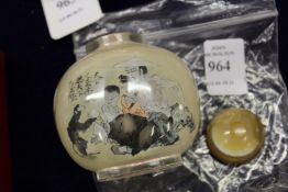 A Chinese reverse painted glass snuff bottle.