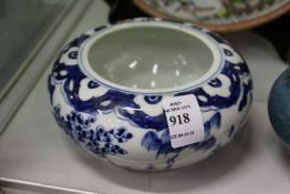 A Chinese blue and white circular porcelain brush washer or censer.