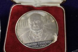 A cast silver Winston Churchill commemorative medallion, boxed.