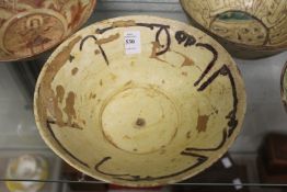 An early Islamic pottery bowl.